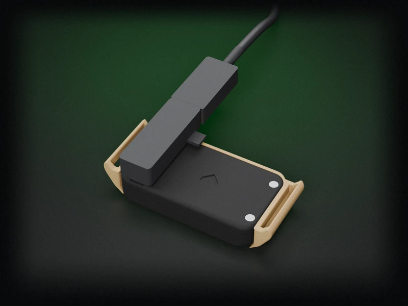 The back of the pod with the magnetic charging cable snapped on